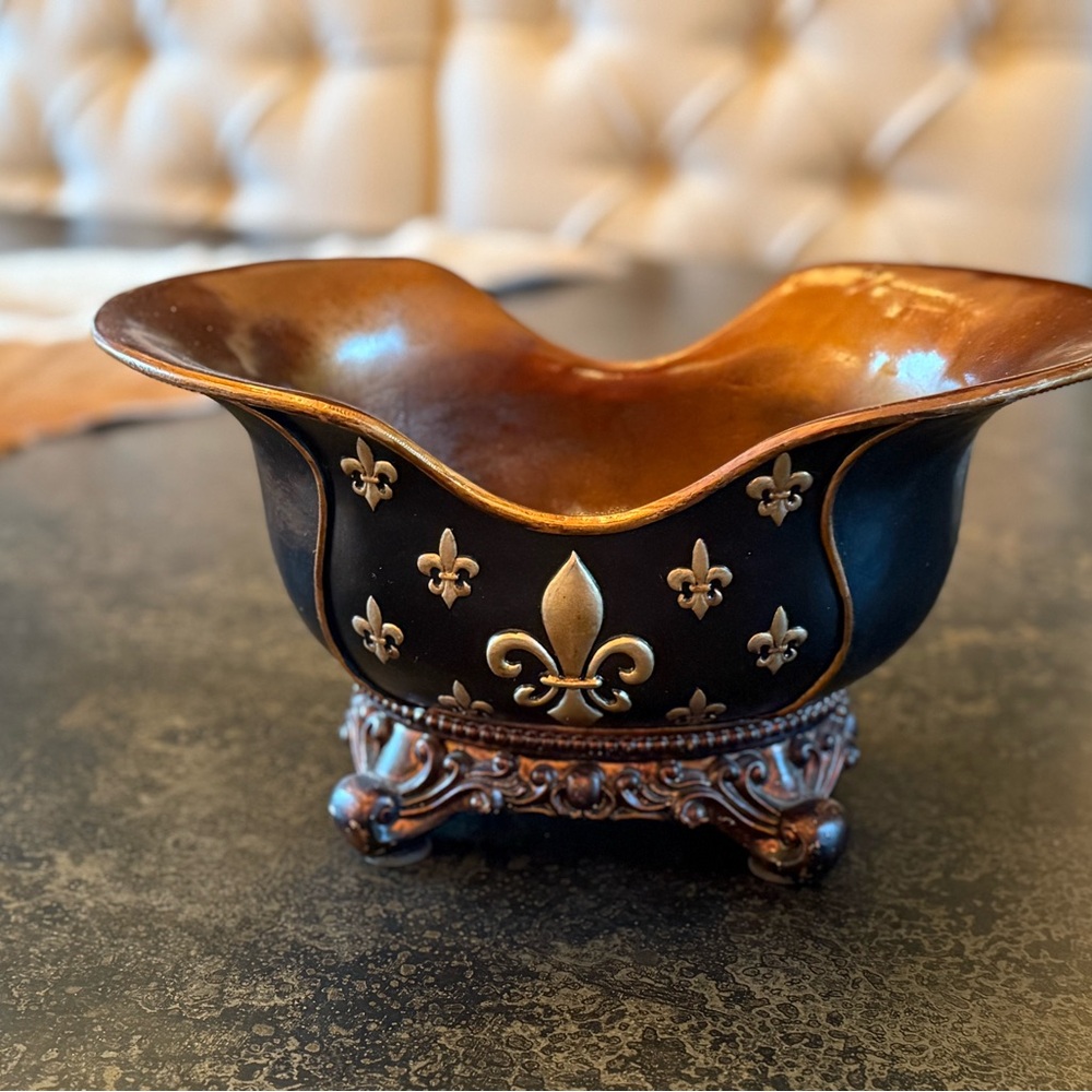 Black and Gold Decorative Vase with Unique Shape and Glossy Finish